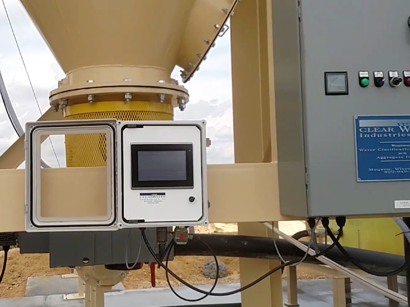 A picture showing Clearwater's AutoFloc messenger mounted to a water clarifier that cleans water for a sand producer.